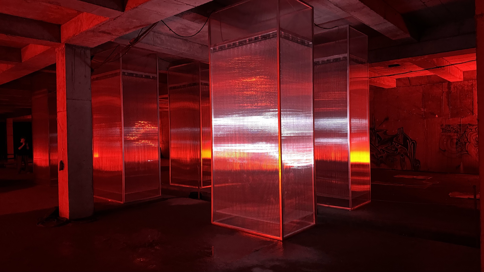 REFRACTION — glowing filaments inside the transparent boxes